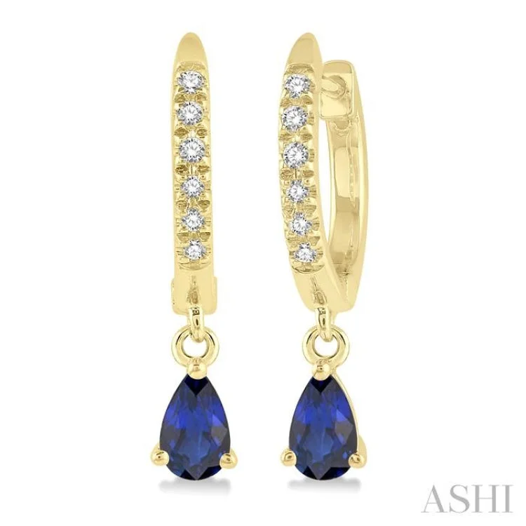 1/8 ctw Round Cut Diamond & 5x3MM Pear Cut Sapphire Petite Fashion Huggie Earrings in 14K Yellow Gold